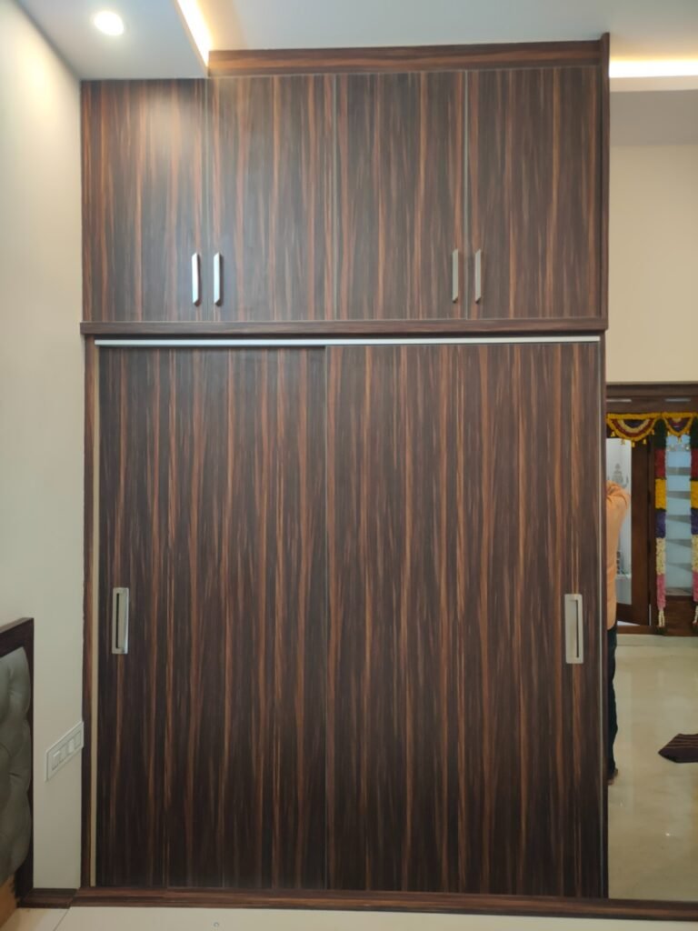 Corner Warrobe design by Dream Home Wood Décor